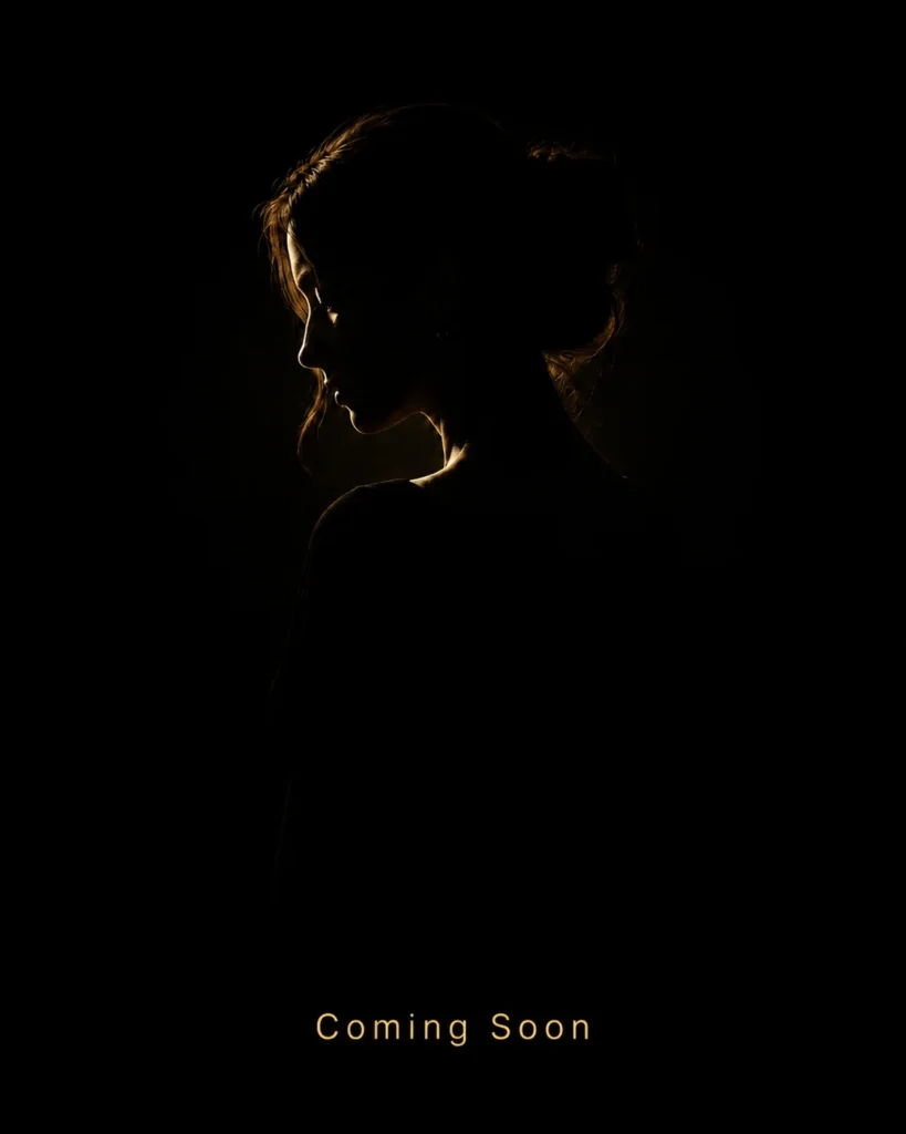 Low-key portrait silhouette placeholder image with Coming Soon text for the portraits photography page.